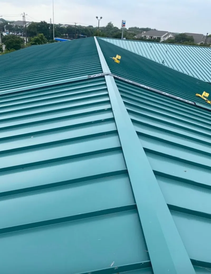 Green commercial metal roof ridge and valley for Metal Roof Repair in Ash